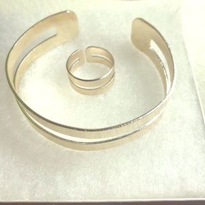 Gold cuff bracelet and ring